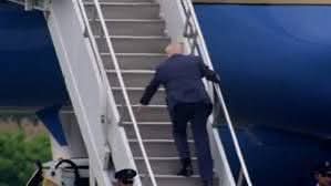 Aging Trump stumbles on plane stairs months after mocking Joe Biden of inability to climb plane